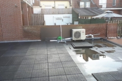 Rubber tegels op het dakterras van een tevreden klant